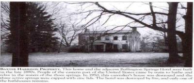 photo of Baxter Harrison Property house with snow on the ground and bare trees in the yard