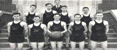 9 players and their coach for the men's basketball team