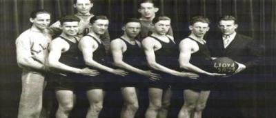 boys basketball teams with their coach and ball